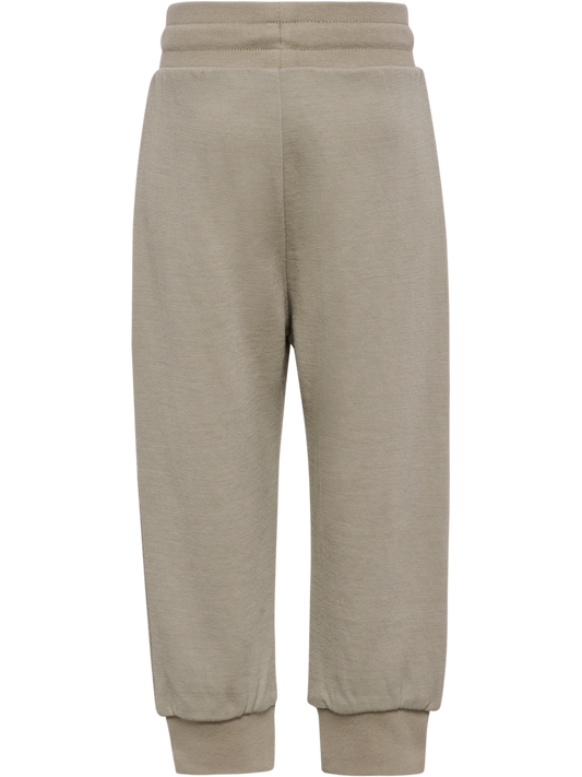 Beige Hummel Mini Wool-bukse sett bakfra, med ribbekant i livet og nederst på bena.