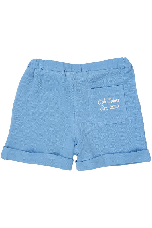 Piquetshorts i lyseblå fra Copenhagen Colors – Gutt 1–7 år.