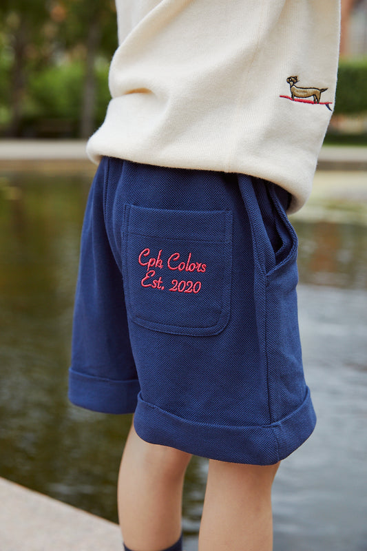 Marineblå piquetshorts fra Copenhagen Colors – Gutt 1–7 år.