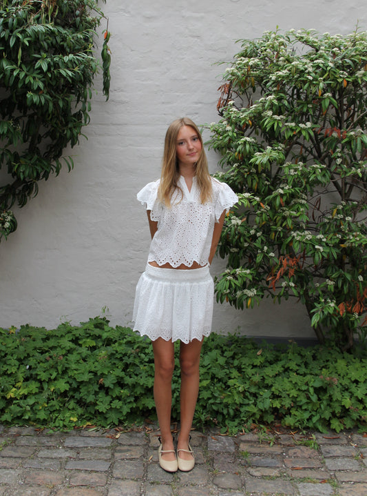 designers remix luna blouse med rysjer i cream – jente