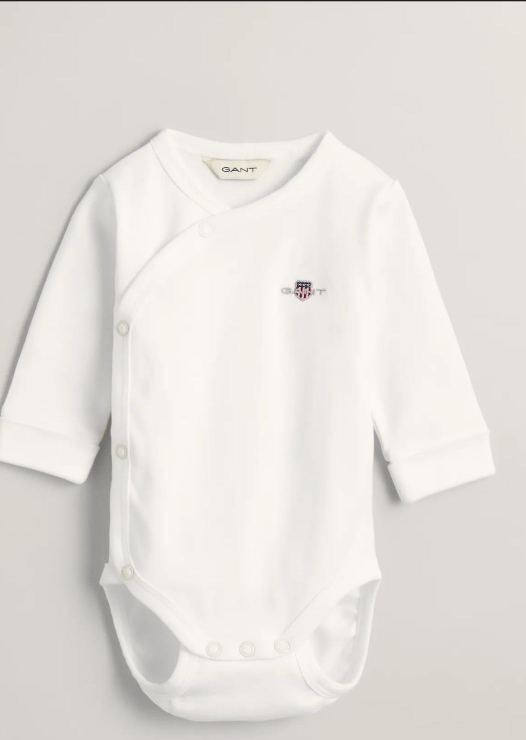 Hvit Gant Shield body i økologisk bomull unisex 1–18 mnd