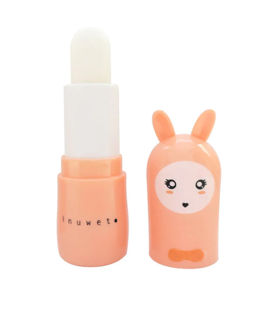 Ferskenfarget lip balm fra inuwet med kaninform og coco vanilla-duft – for jente