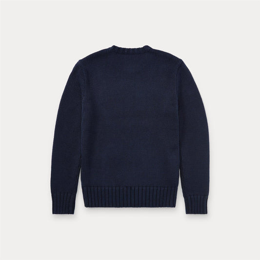 Strikket mørkeblå genser fra Ralph Lauren med amerikansk flagg på brystet. 100% bomull. Passer gutter 2–7 år.