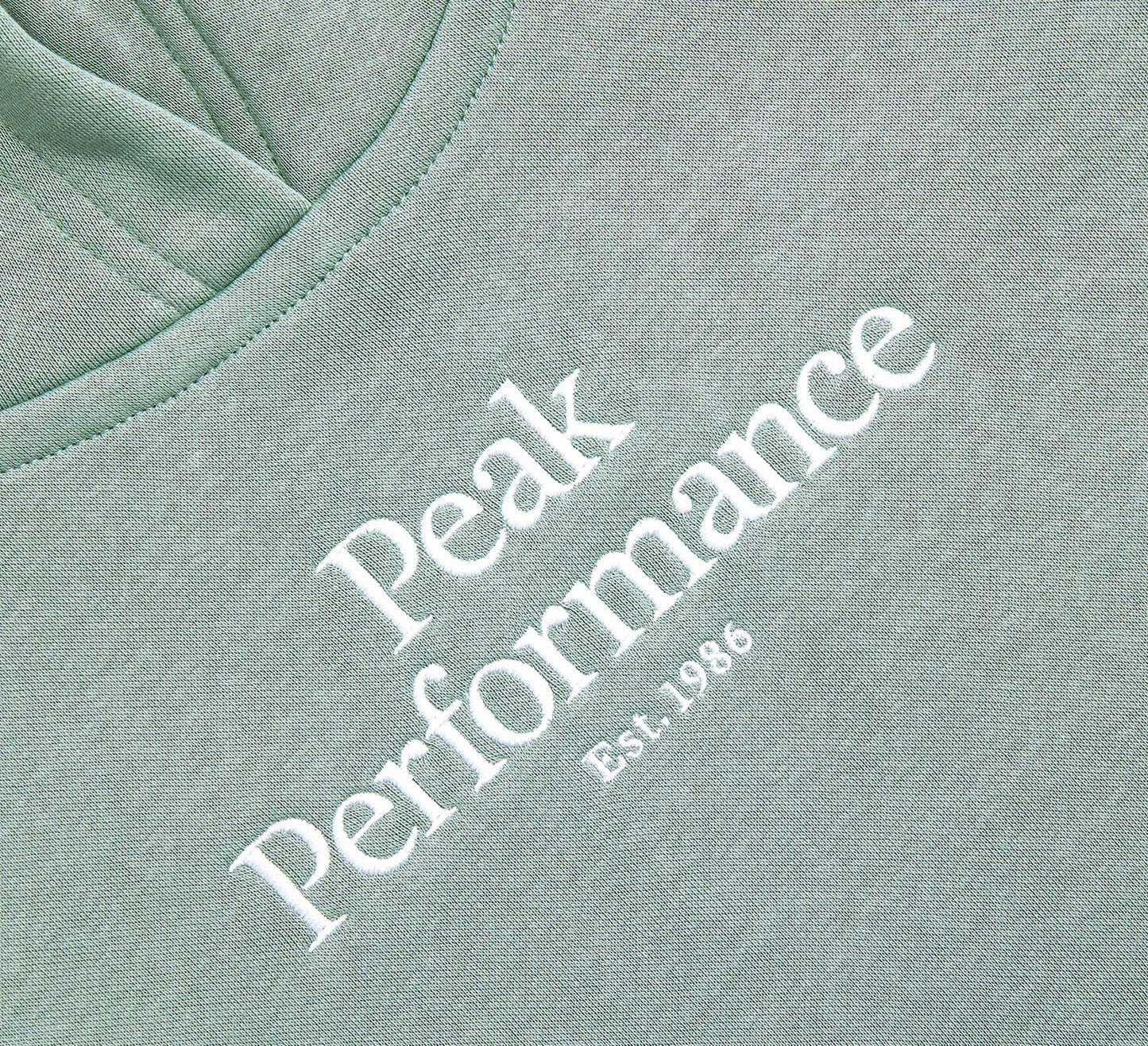 Peak Performance – Hettegenser med grønn farge – Unisex – 15 år