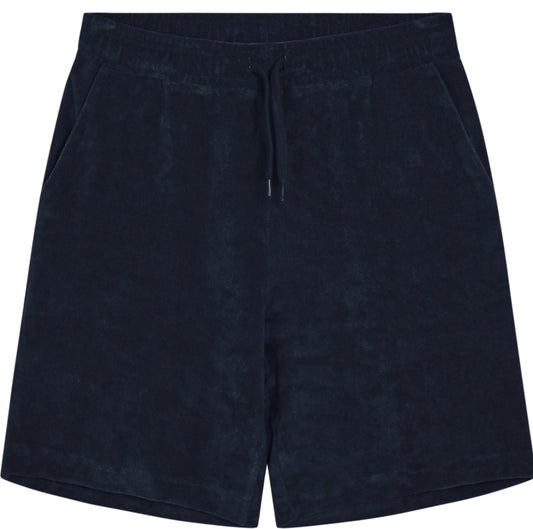 Grunt Beringen frottéshorts i marineblå – sett forfra.