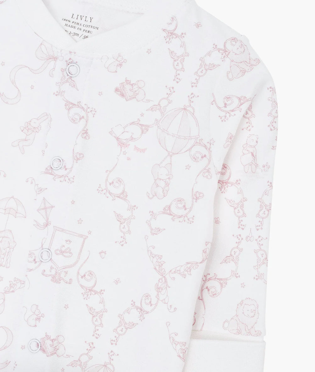 Heldrakt fra Livly i hvit med rosa Wonderland-print og glidelås, jente 0–12 mnd
