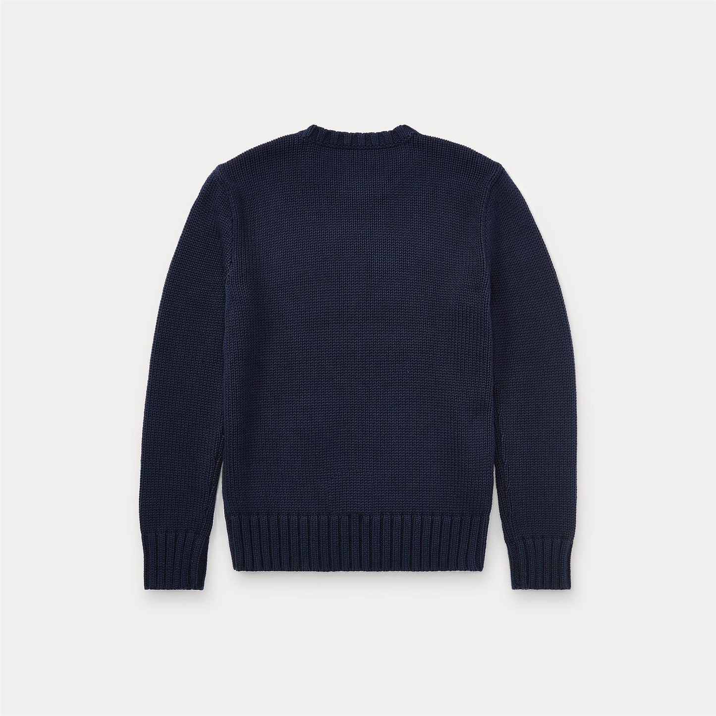 Strikket mørkeblå genser fra Ralph Lauren med amerikansk flagg på brystet. 100% bomull. Passer gutter 2–7 år.