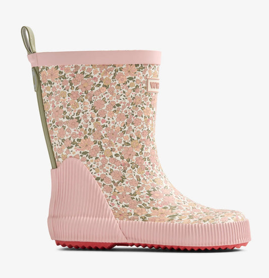 Wheat gummistøvler med høyt skaft og rosa blomsterprint – sett fra flere vinkler og i bruk.