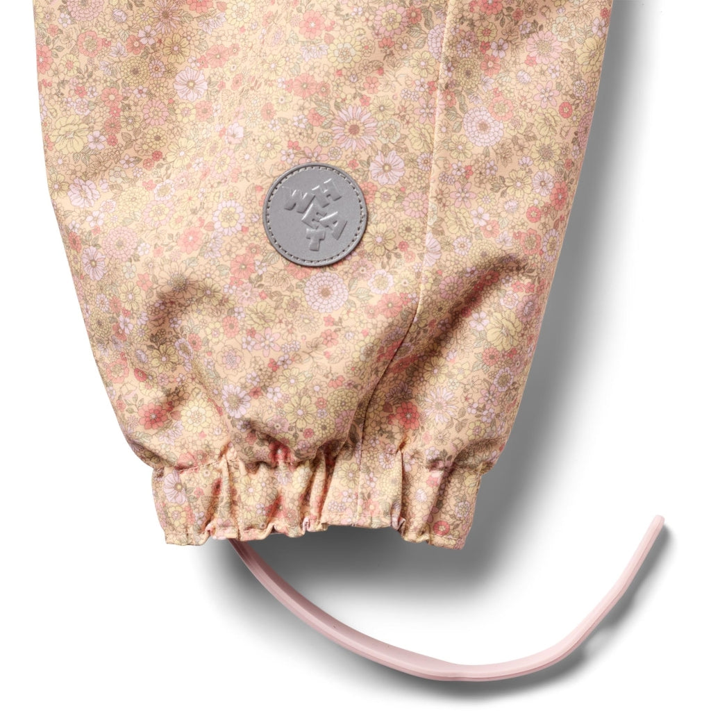 Wheat Olly Tech vårdress i Lemonade Flowers-print med refleks og glidelås, jente 9 mnd–3 år
